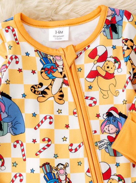Honey Christmas character printed on checker baby onesie